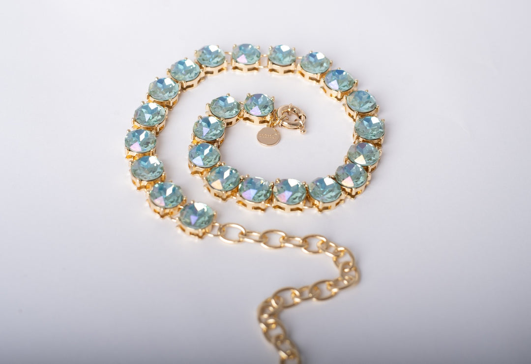 Blauw van C gold plated necklace with Aqua Blue crystals and chain.