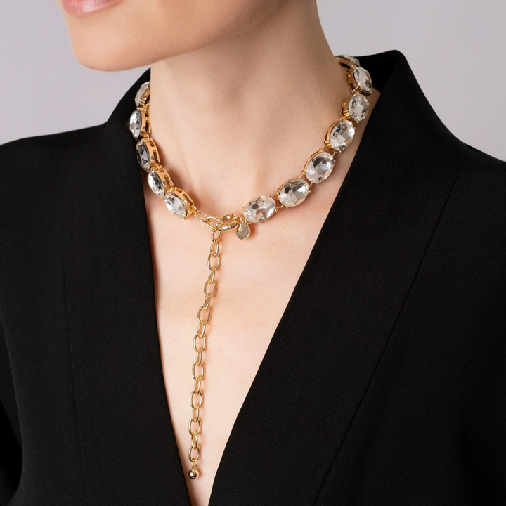 Anna Wintour inspired crystal necklace with front drop on a model wearing a black outfit.