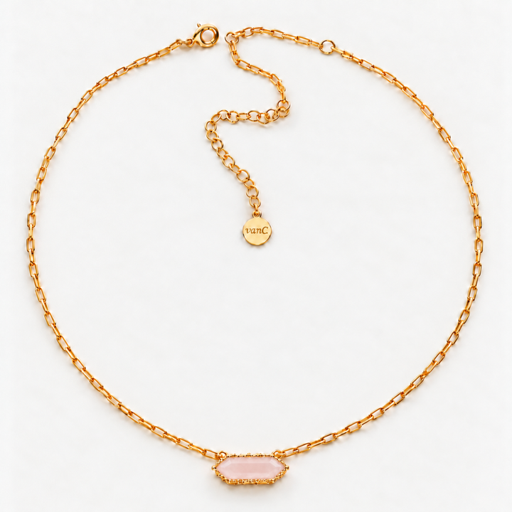 Blauw van C Andalus Necklace with a light pink agate pendant and 18K gold-plated link chain, showing the lobster clasp, brand tag and extender on an off-white background.