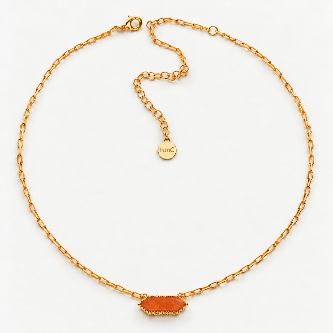 Blauw van C Andalus Necklace in Seville Orange, showing the agate pendant, 18K gold-plated link chain, clasp and extender on an off-white background.